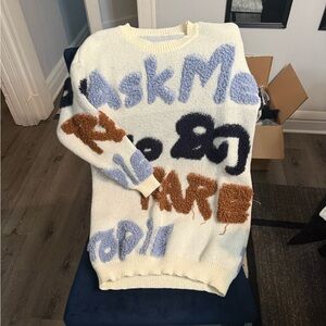 Stylish Cream Sweater with Graphic Design